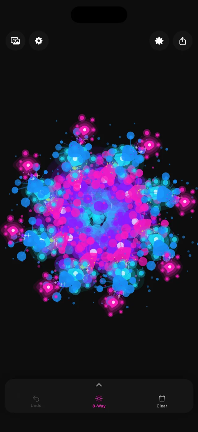 A kaleidoscope mandala painted with 8-way symmetry on a black canvas
